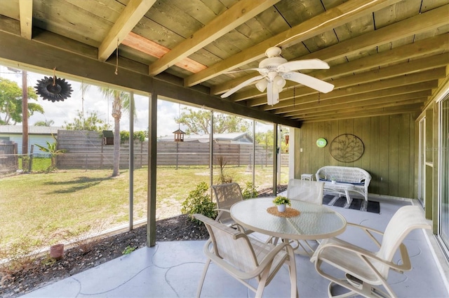 4535 Maceachen Blvd, Sarasota, FL 34233 - sunroom / solarium with ceiling fan, beamed ceiling, and outdoor dining area
