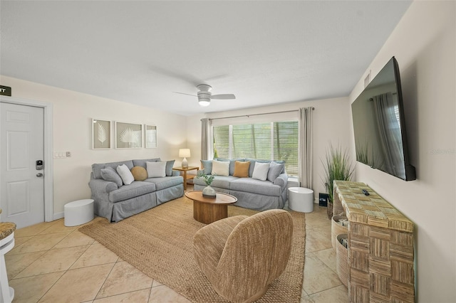 308 Canal Rd, Sarasota, FL 34242 - living area with ceiling fan and light tile patterned floors