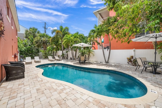 308 Canal Rd, Sarasota, FL 34242 - view of pool featuring a patio, a fenced backyard, and outdoor dining space