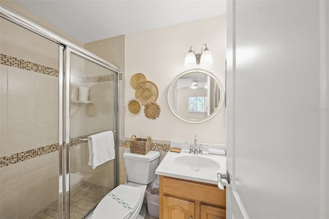 308 Canal Rd, Sarasota, FL 34242 - bathroom with toilet, vanity, and a shower stall