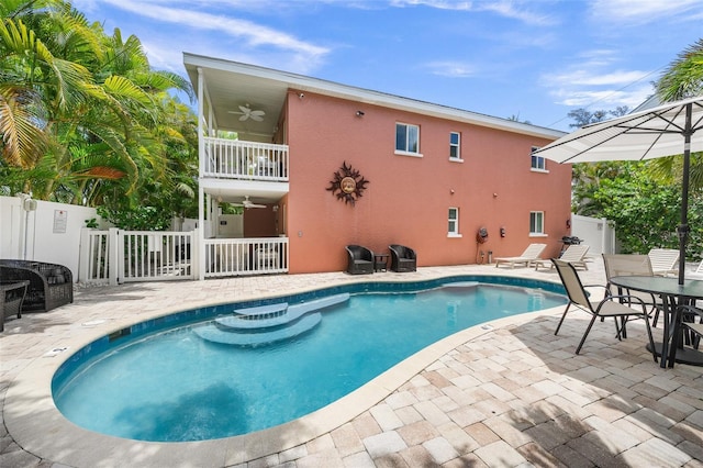 308 Canal Rd, Sarasota, FL 34242 - outdoor pool featuring ceiling fan and a patio area