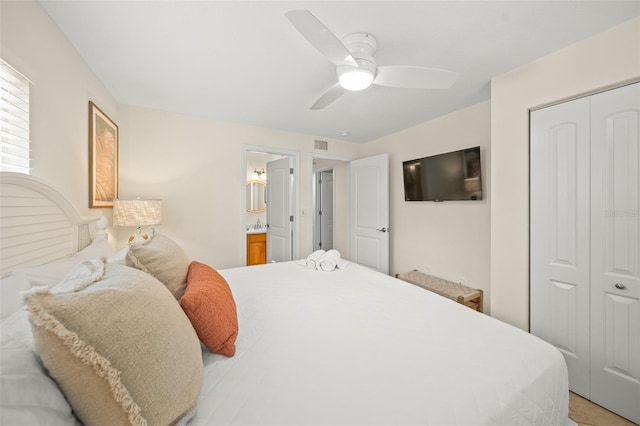 308 Canal Rd, Sarasota, FL 34242 - bedroom with a closet, ceiling fan, and connected bathroom