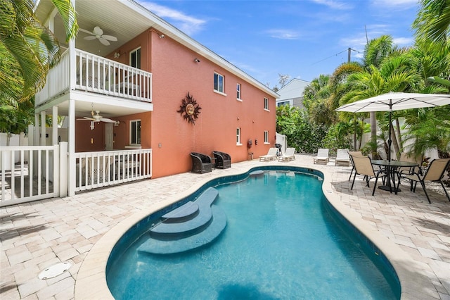 308 Canal Rd, Sarasota, FL 34242 - outdoor pool featuring a ceiling fan and a patio
