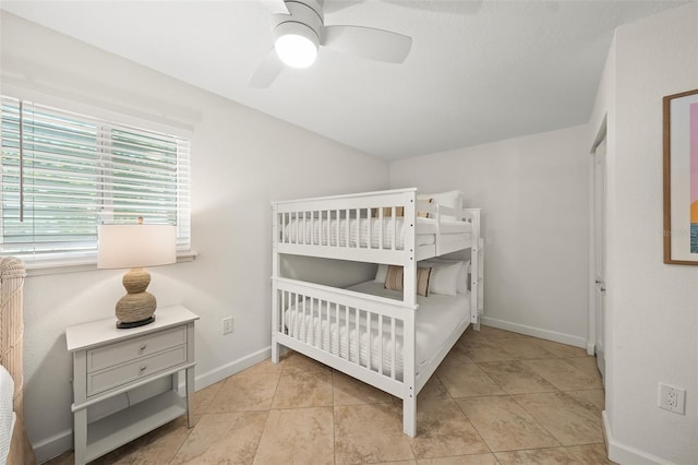 308 Canal Rd, Sarasota, FL 34242 - bedroom featuring baseboards, ceiling fan, and light tile patterned flooring
