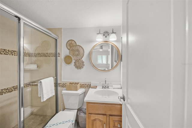 308 Canal Rd, Sarasota, FL 34242 - full bath featuring vanity, toilet, and a shower stall