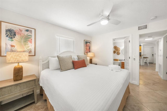 308 Canal Rd, Sarasota, FL 34242 - bedroom with light tile patterned flooring and ceiling fan