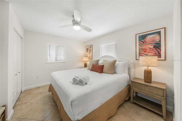 308 Canal Rd, Sarasota, FL 34242 - bedroom featuring multiple windows, light tile patterned floors, and ceiling fan