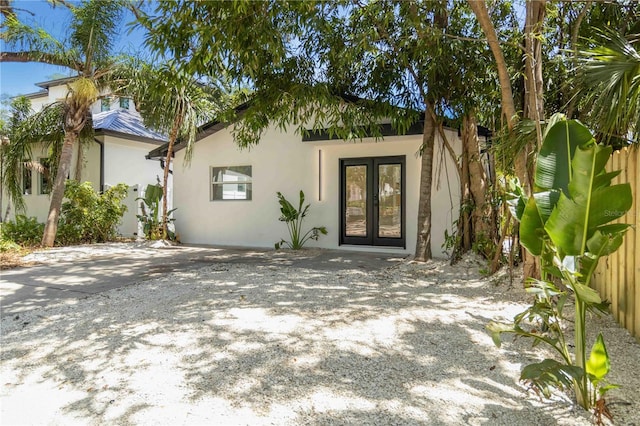 2410 Floyd St, Sarasota, FL 34239 - entrance to property with french doors and stucco siding