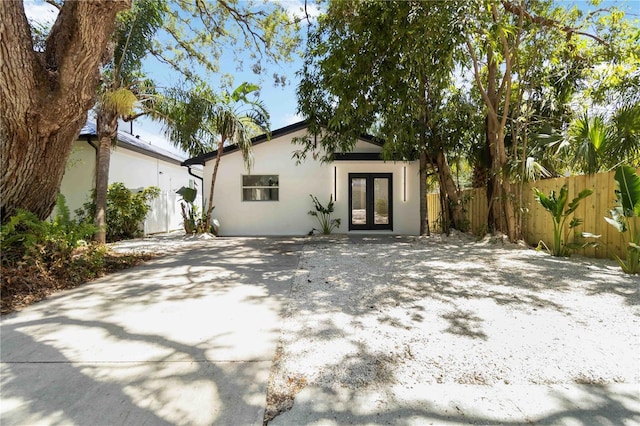2410 Floyd St, Sarasota, FL 34239 - mid-century inspired home with french doors and stucco siding