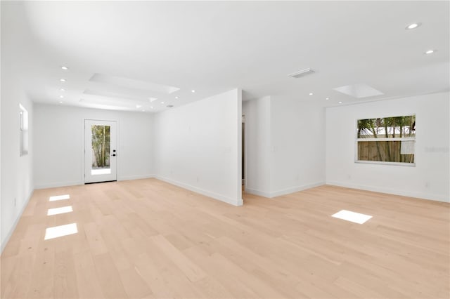 2410 Floyd St, Sarasota, FL 34239 - unfurnished room with light wood finished floors and recessed lighting