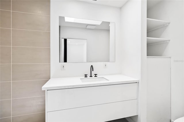 2410 Floyd St, Sarasota, FL 34239 - bathroom featuring vanity and a skylight