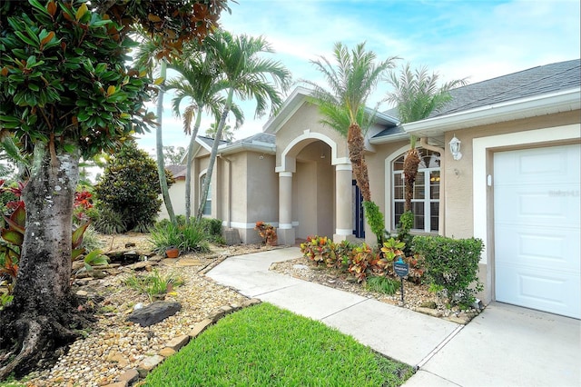 5905 32nd St E, Ellenton, FL 34222 - entrance to property with stucco siding and a garage