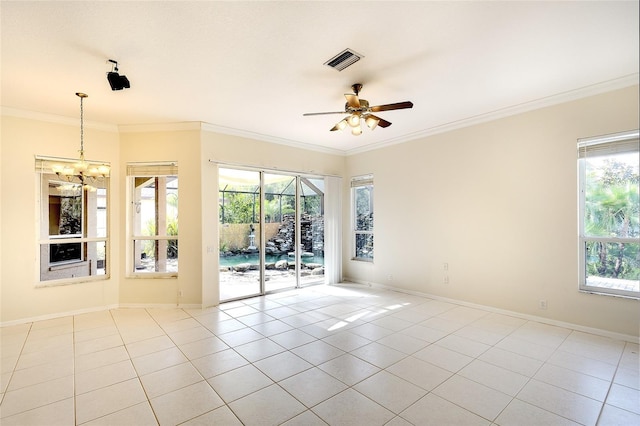 5905 32nd St E, Ellenton, FL 34222 - tiled spare room with a chandelier, a ceiling fan, ornamental molding, and plenty of natural light