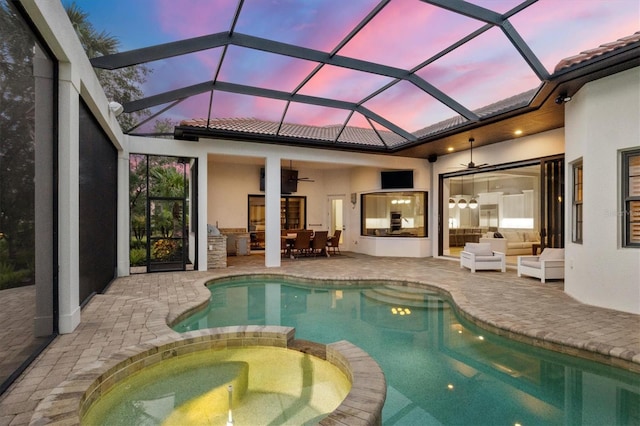 8312 Catamaran Cir, Lakewood Ranch, FL 34202 - view of swimming pool featuring a pool with connected hot tub, a patio, an outdoor hangout area, ceiling fan, and glass enclosure