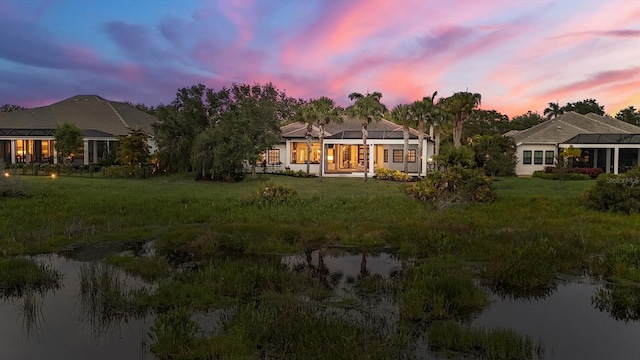 8312 Catamaran Cir, Lakewood Ranch, FL 34202 - back of house featuring a water view