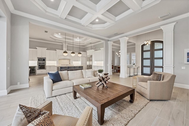 8312 Catamaran Cir, Lakewood Ranch, FL 34202 - living room featuring ornate columns, baseboards, coffered ceiling, beam ceiling, and light wood finished floors