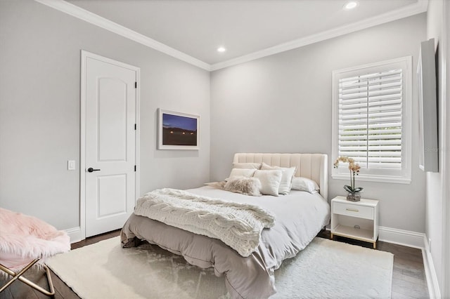 8312 Catamaran Cir, Lakewood Ranch, FL 34202 - bedroom featuring wood finished floors, ornamental molding, baseboards, and recessed lighting