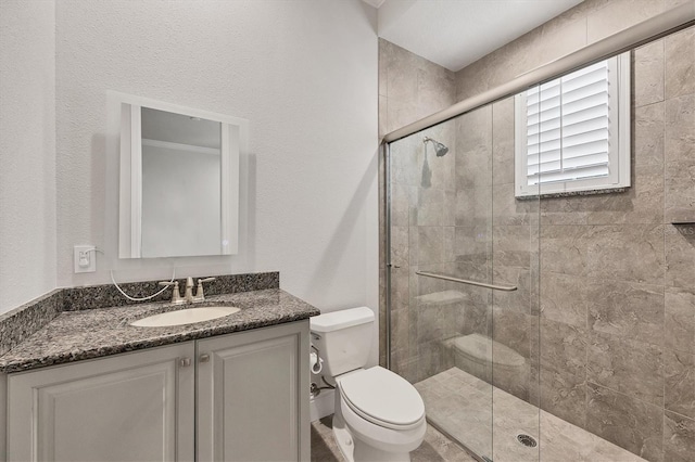 8312 Catamaran Cir, Lakewood Ranch, FL 34202 - full bathroom featuring toilet, a stall shower, and vanity