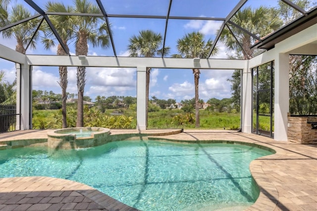 8312 Catamaran Cir, Lakewood Ranch, FL 34202 - view of pool with glass enclosure, a patio area, and a pool with connected hot tub
