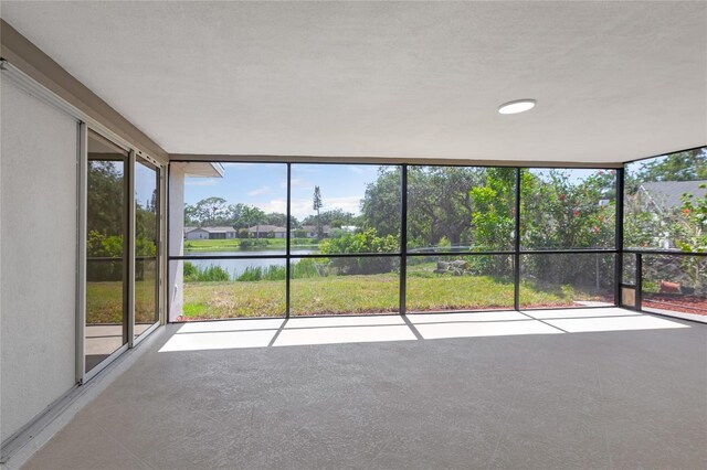 6572 Mauna Loa Blvd, Sarasota, FL 34241 - unfurnished sunroom featuring a water view