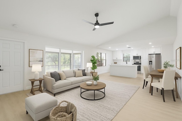 6572 Mauna Loa Blvd, Sarasota, FL 34241 - living room featuring ceiling fan, light wood finished floors, high vaulted ceiling, and recessed lighting