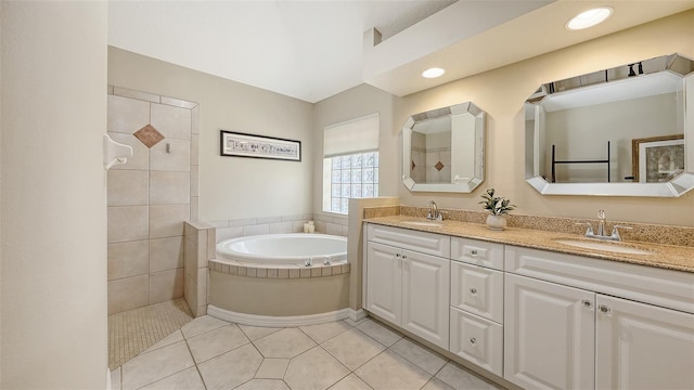5698 Country Walk Ln, Sarasota, FL 34233 - bathroom featuring a bath, double vanity, a walk in shower, tile patterned flooring, and recessed lighting