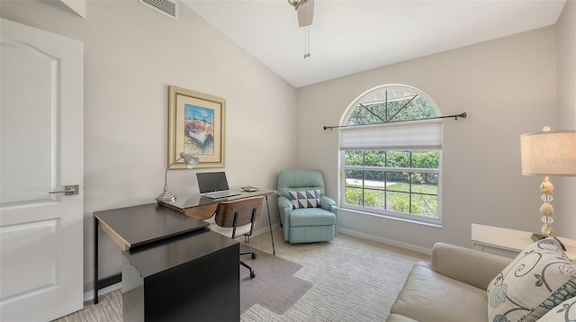 5698 Country Walk Ln, Sarasota, FL 34233 - home office with baseboards, vaulted ceiling, and carpet
