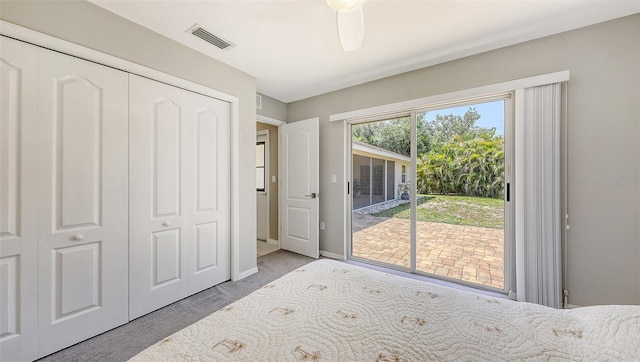 5698 Country Walk Ln, Sarasota, FL 34233 - unfurnished bedroom with access to outside, carpet, a closet, and baseboards