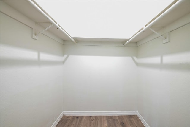 478 Orange Dr NW, Port Charlotte, FL 33952 - walk in closet featuring wood finished floors