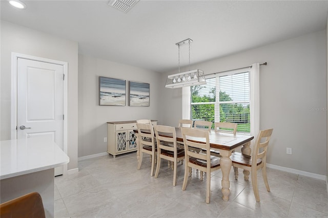 9148 Royal River Cir, Parrish, FL 34219 - dining area featuring baseboards, recessed lighting, and light tile patterned flooring
