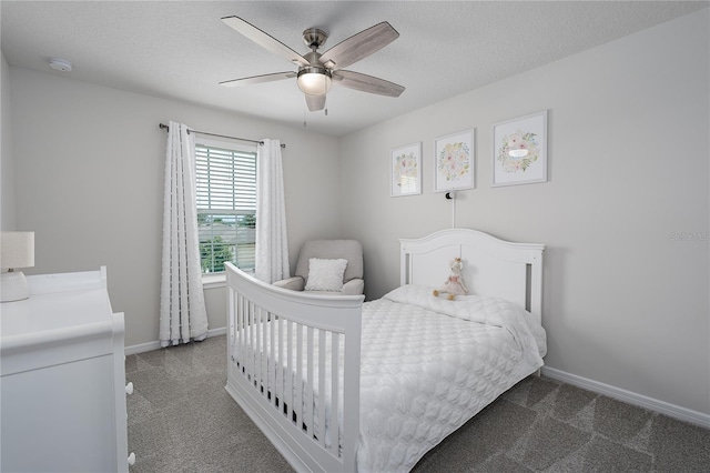 9148 Royal River Cir, Parrish, FL 34219 - carpeted bedroom featuring baseboards, ceiling fan, and a textured ceiling