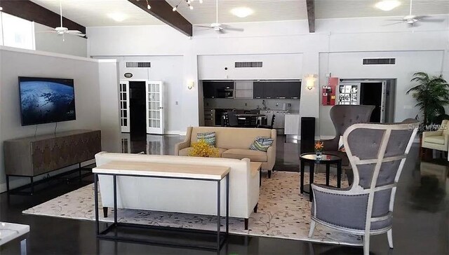 2650 Coconut Bay Ln Unit 521, Sarasota, FL 34237 - living room with ceiling fan and beam ceiling