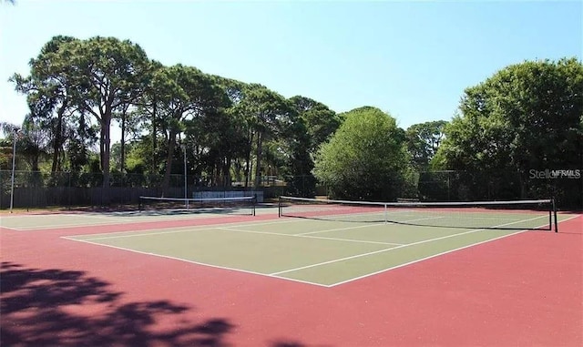 2650 Coconut Bay Ln Unit 521, Sarasota, FL 34237 - view of tennis court with community basketball court