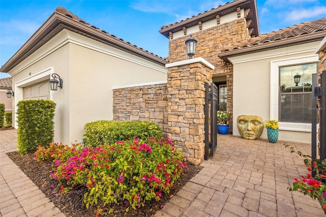 5011 Tivoli Run, Bradenton, FL 34211 - view of patio / terrace with an attached garage