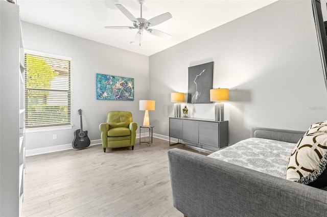 5011 Tivoli Run, Bradenton, FL 34211 - bedroom with wood finished floors, baseboards, and a ceiling fan