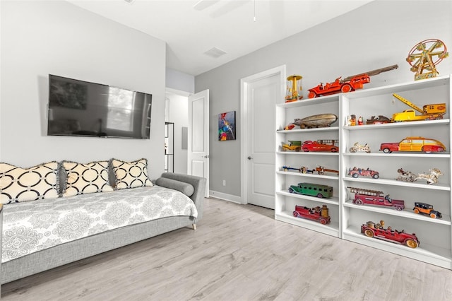 5011 Tivoli Run, Bradenton, FL 34211 - bedroom featuring wood finished floors, baseboards, and a ceiling fan