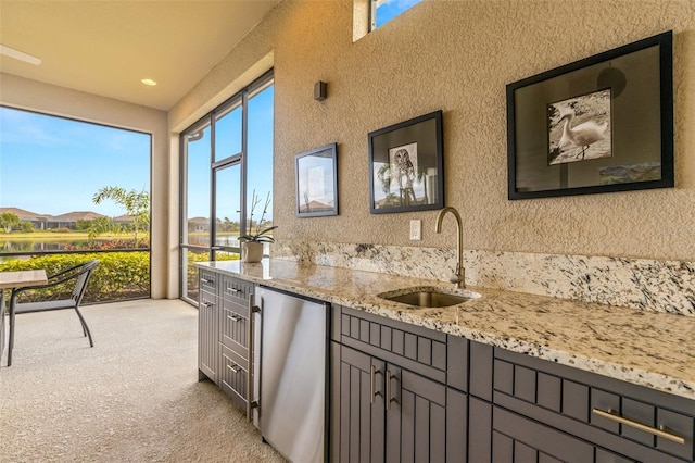 5011 Tivoli Run, Bradenton, FL 34211 - bar area with a sink, stainless steel refrigerator, light carpet, and recessed lighting