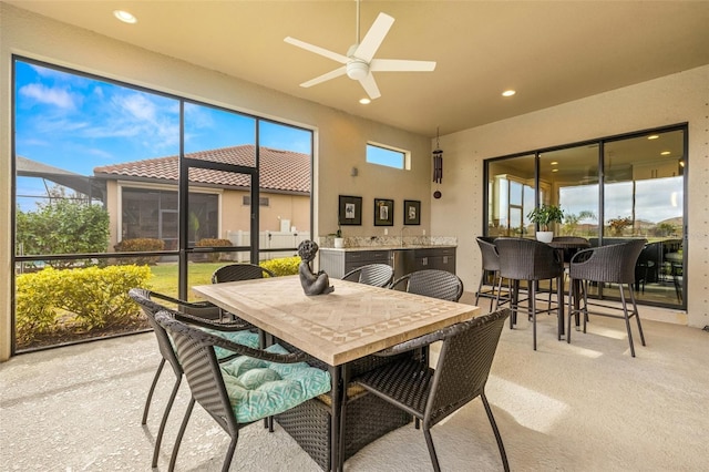 5011 Tivoli Run, Bradenton, FL 34211 - sunroom / solarium featuring outdoor dining area and ceiling fan