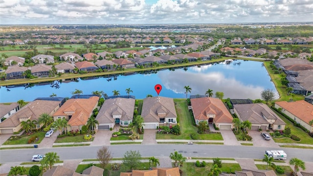 5011 Tivoli Run, Bradenton, FL 34211 - aerial perspective of suburban area featuring a nearby body of water