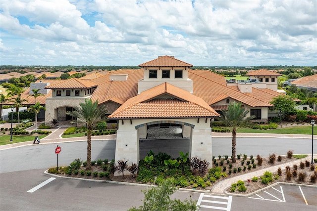 5011 Tivoli Run, Bradenton, FL 34211 - view of building exterior featuring a residential view and uncovered parking