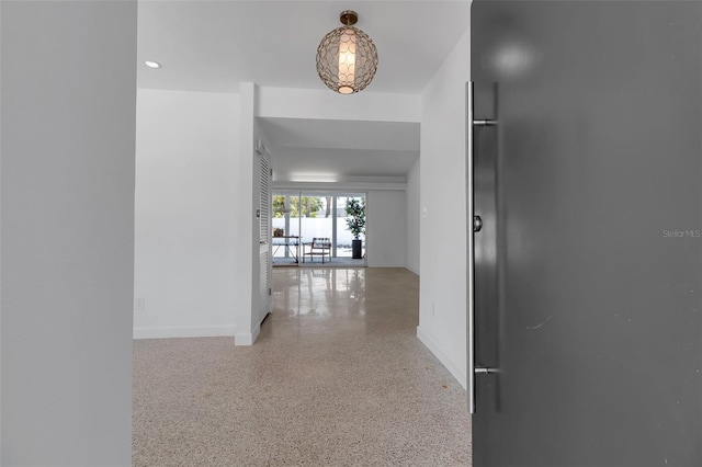 130 N Adams Dr, Sarasota, FL 34236 - hallway with baseboards, speckled floor, and recessed lighting
