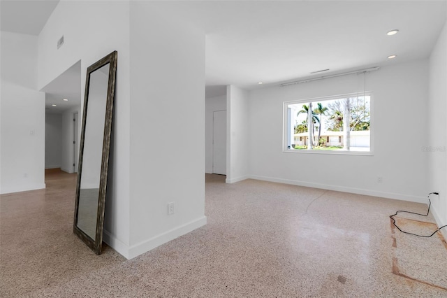 130 N Adams Dr, Sarasota, FL 34236 - unfurnished room with recessed lighting, speckled floor, and baseboards