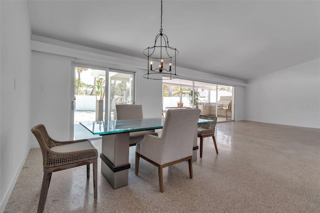130 N Adams Dr, Sarasota, FL 34236 - dining area with speckle patterned floor and a chandelier