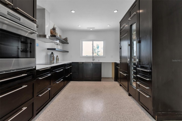 130 N Adams Dr, Sarasota, FL 34236 - kitchen featuring oven, black electric stovetop, light countertops, recessed lighting, and open shelves