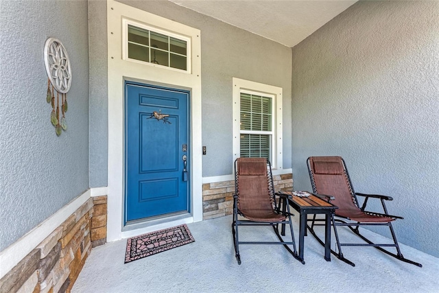 1219 Thornbury Dr, Parrish, FL 34219 - entrance to property featuring stone siding and stucco siding