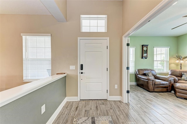 1219 Thornbury Dr, Parrish, FL 34219 - foyer entrance featuring wood finished floors and baseboards