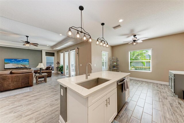 1219 Thornbury Dr, Parrish, FL 34219 - kitchen with a sink, ceiling fan, hanging light fixtures, dishwasher, and recessed lighting