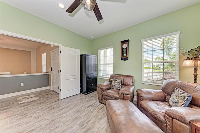 1219 Thornbury Dr, Parrish, FL 34219 - living room featuring a ceiling fan, light wood-type flooring, and baseboards