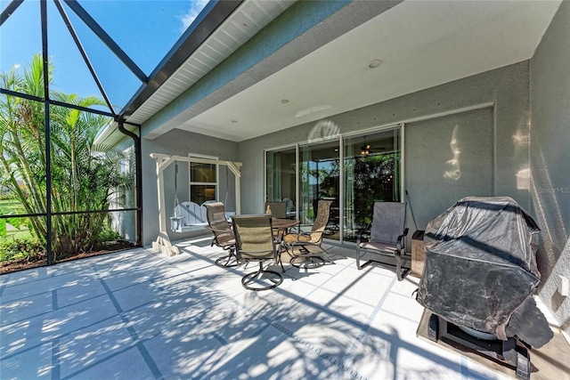 1219 Thornbury Dr, Parrish, FL 34219 - view of patio / terrace with a lanai and outdoor dining area
