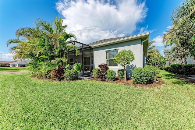 1219 Thornbury Dr, Parrish, FL 34219 - view of front of property featuring stucco siding, a front yard, and a lanai